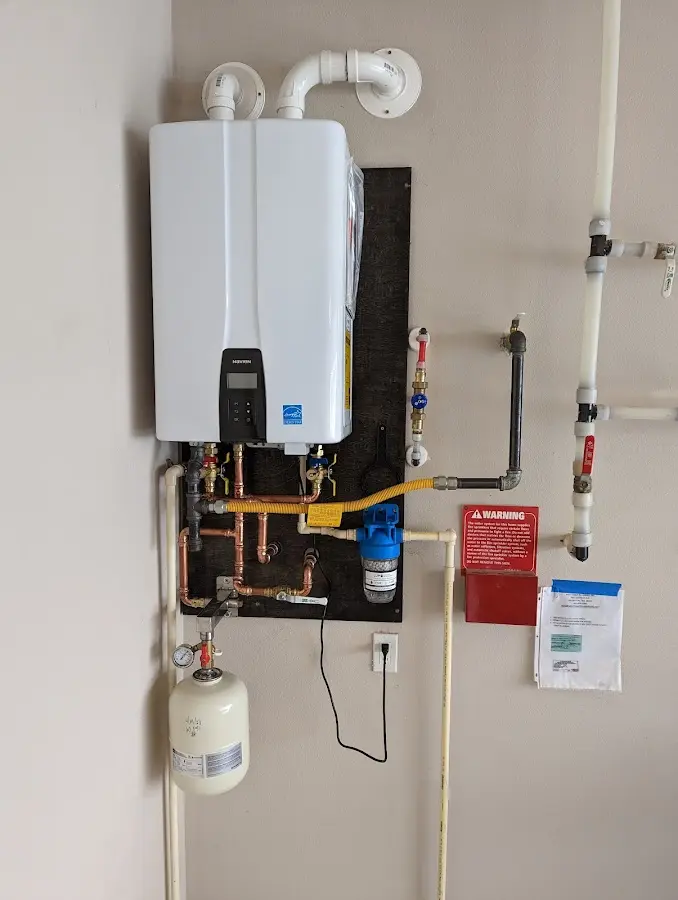 Professional plumber installing copper piping in a Westlake Village home